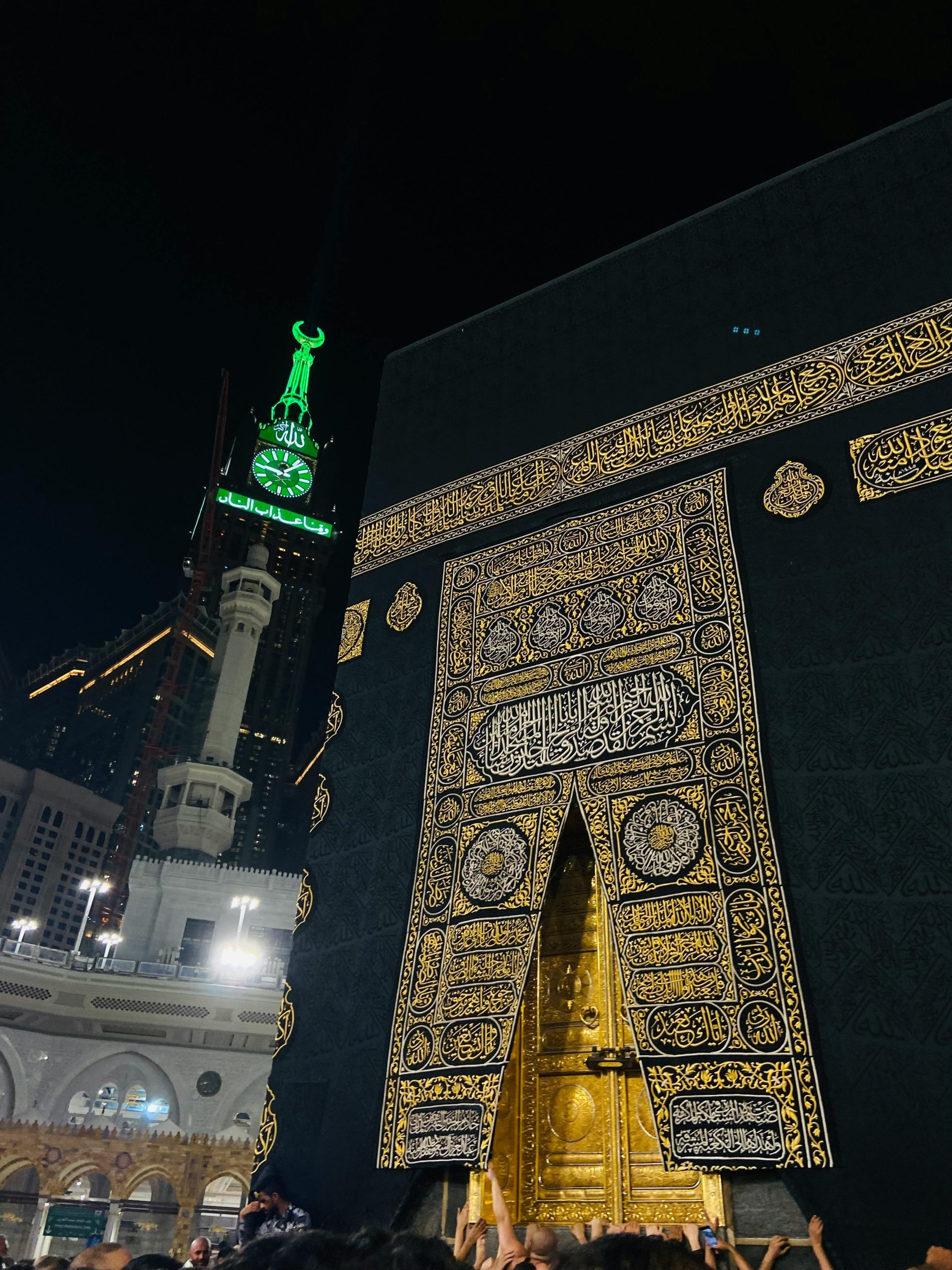 Night view of the Kaaba and the clock tower in Mecca